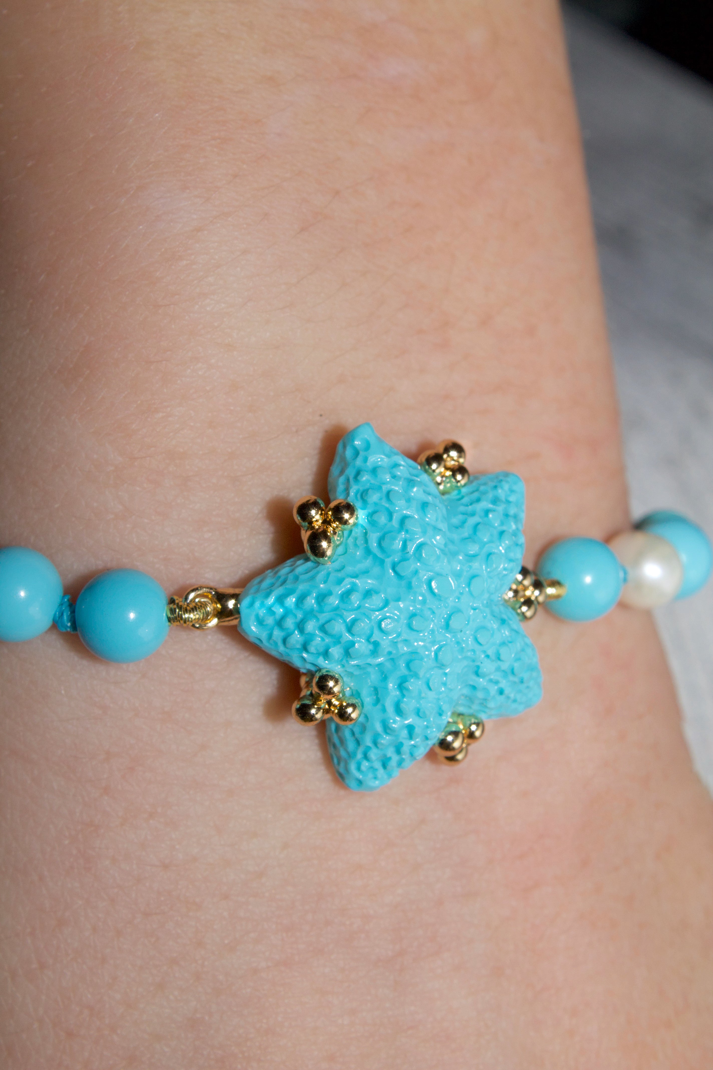 bracciale-artigianale-donna-argento-stella-e-pietre-pasta-turchese-perle  Modifica testo alternativo